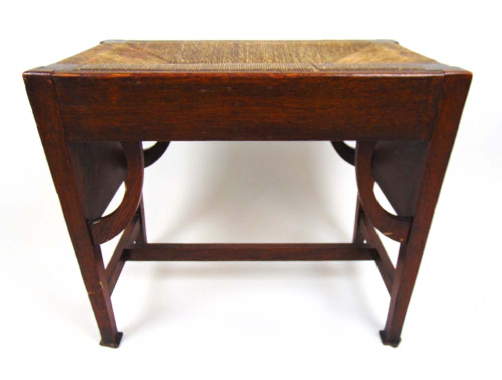 A late 19th century Arts and Crafts oak