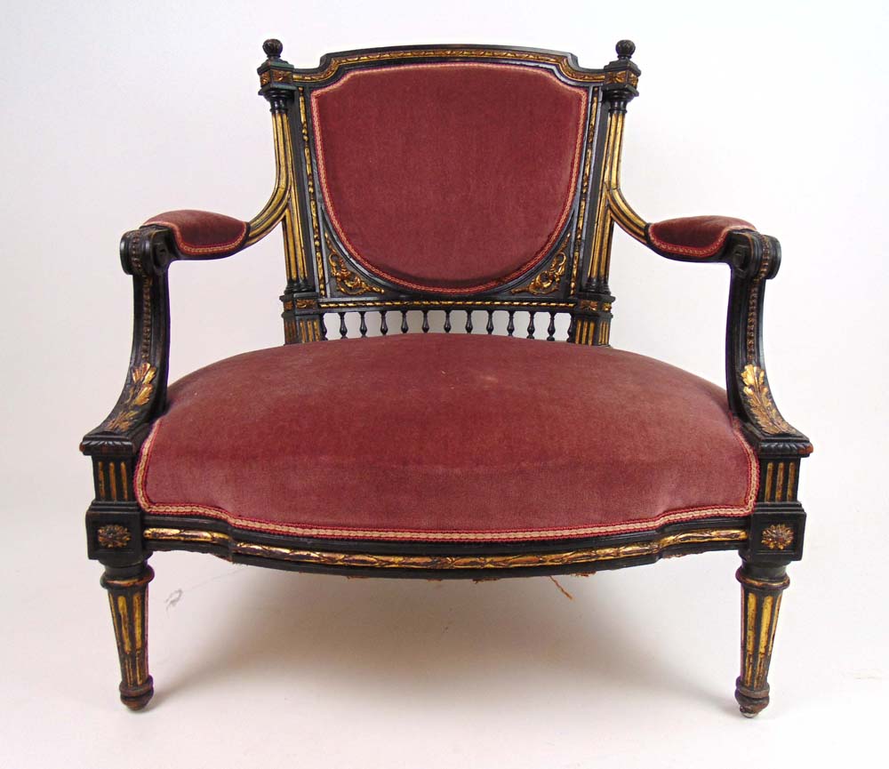 A 19th century ebonized and parcel gilt