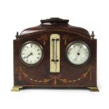 An Edwardian mahogany inlaid clock and b