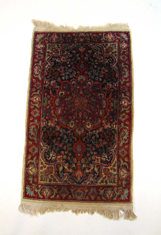 A handwoven Persian rug, the herati bord