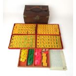 An early 20th century Mahjong set having