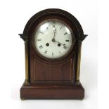 An Edwardian mahogany and brass mounted