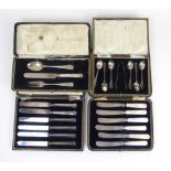 Two cased sets of silver handled knives