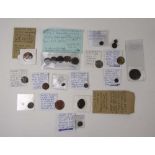 A collection of coinage, tokens and butt