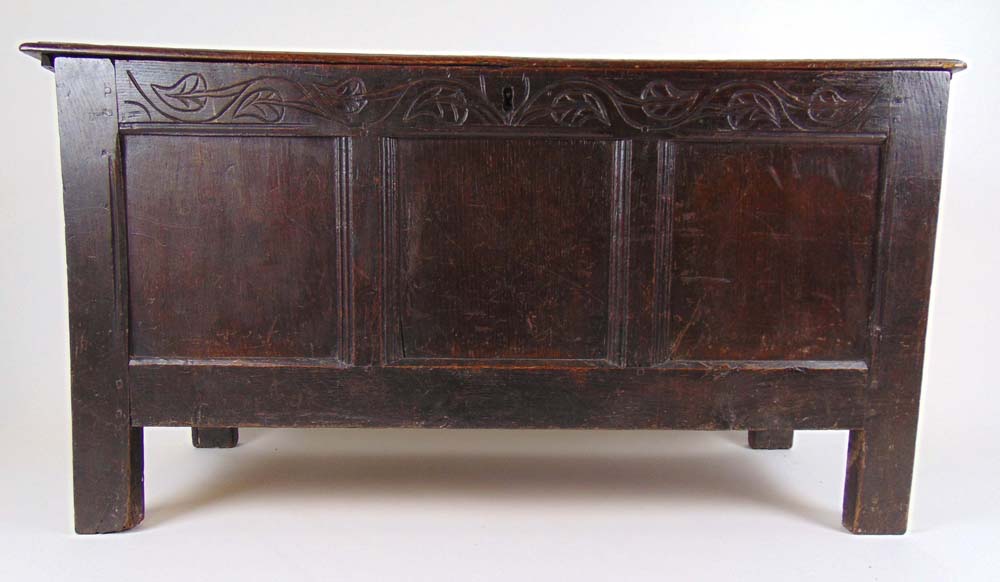 An 18th century oak coffer, the moulded