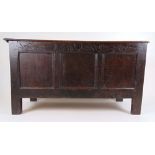 An 18th century oak coffer, the moulded