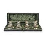 A cased set of four George V silver plac