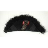 A late 19th century black bicorn hat hav