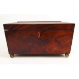 A Regency mahogany sarcophagus tea caddy