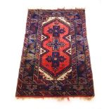 A handwoven Turkish rug, the triple line