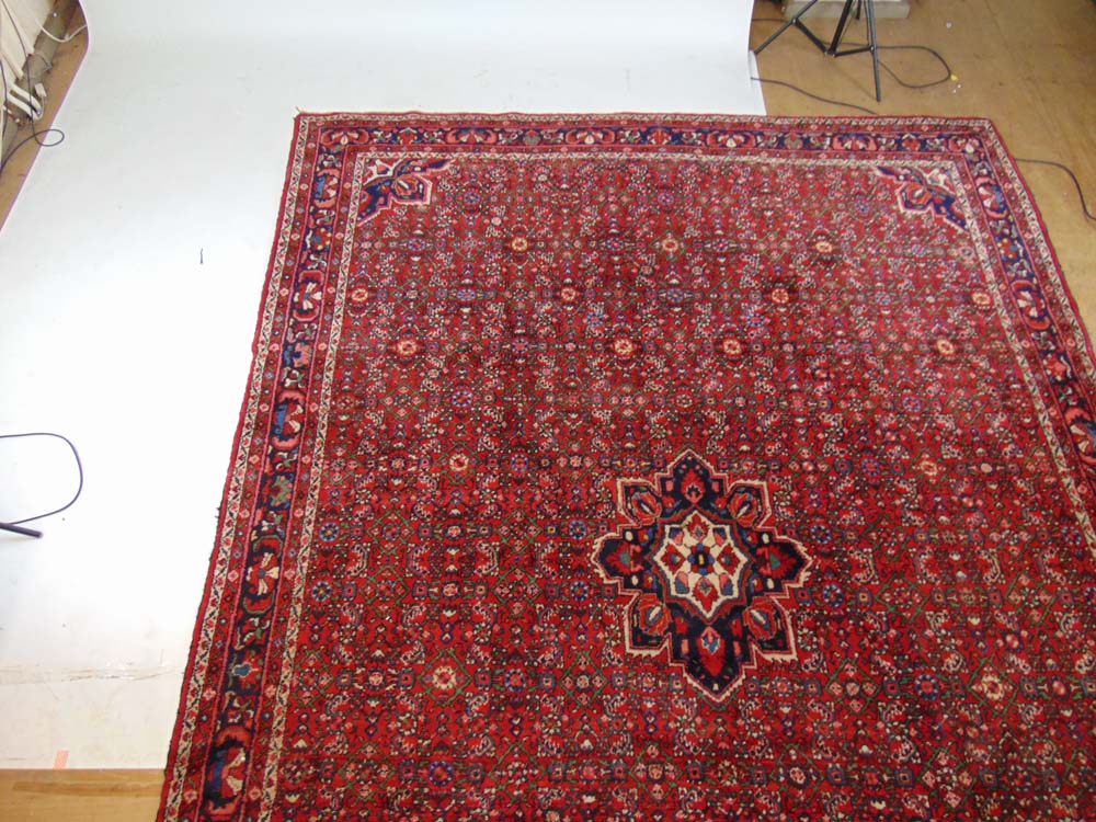 A handwoven Persian rug, the multi line - Image 2 of 3