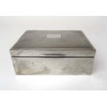 A Elizabeth II silver cigarette box havi