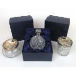 Two boxed Elizabeth II silver topped dre