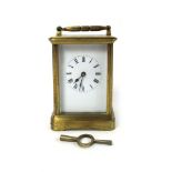 A late 19th century brass carriage clock