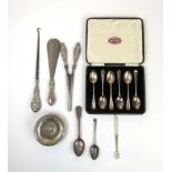 An assortment of silver items to include