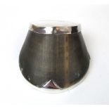 A white metal mounted horse hoof, the to