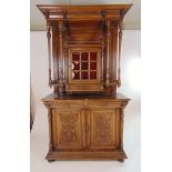 A late 19th century oak display cabinet/