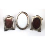 A pair of Edwardian silver photo frames