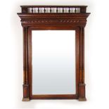 A late 19th century oak framed over mant