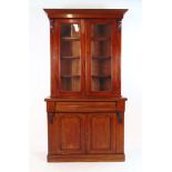 A 19th century mahogany bookcase, the co