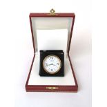 A Cartier travel/desk alarm clock. Quart