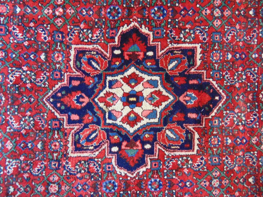 A handwoven Persian rug, the multi line - Image 3 of 3