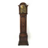 An early 20th century oak longcase clock