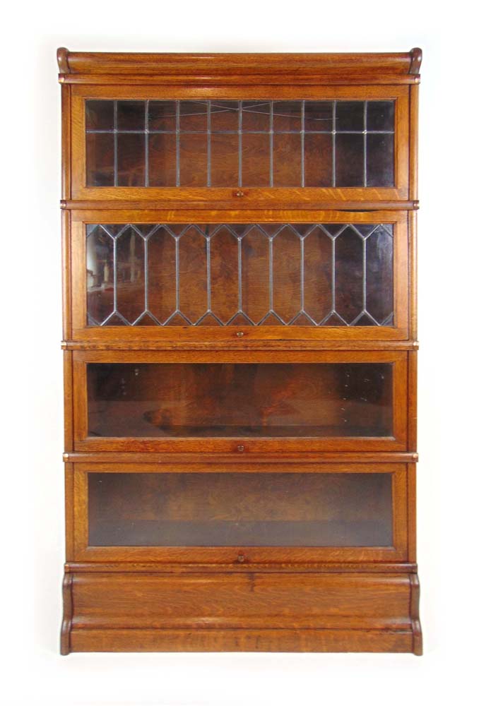 An early 20th century oak sectional book