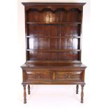 A reproduction oak 17th century style dr