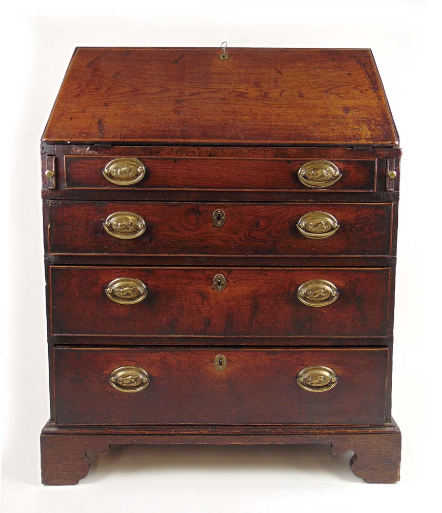 An 18th century oak bureau, the fall fro