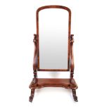 A Victorian mahogany cheval mirror, the