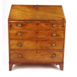 A George III mahogany bureau, the fall f