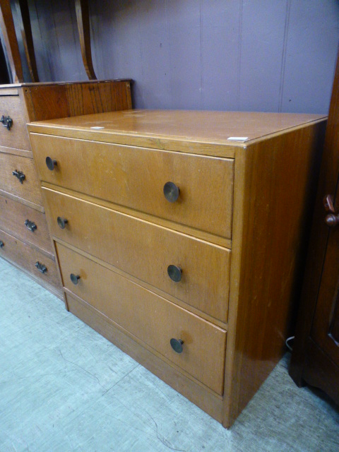 A mid-20th century oak veneered chest of