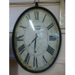 A reproduction antique style wall clock