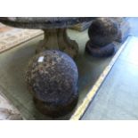 Two weathered garden stoneware spheres o