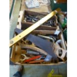 Two trays of hand tools to include saws,