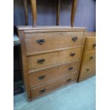 A mid-20th century oak four drawer chest