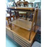 A mid-20th century teak two tier trolley