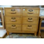 A mid 20th century bank of six drawers