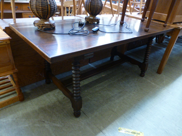 A reproduction oak rectangular table hav