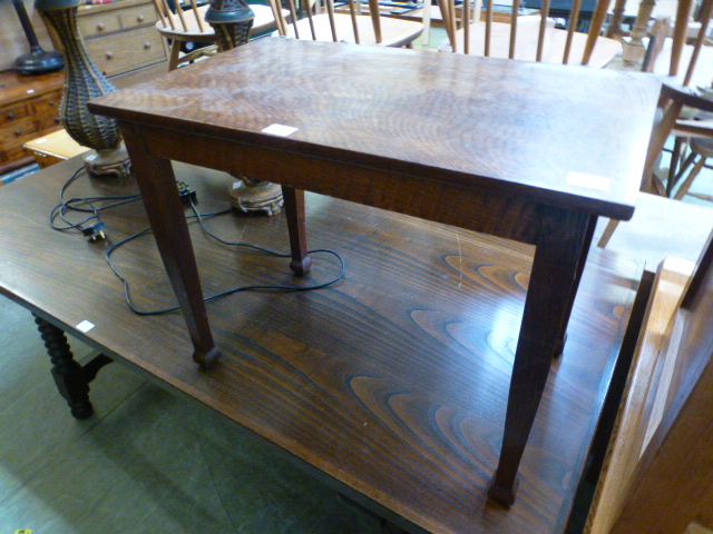 An early 20th century oak occasional tab