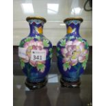 A pair of oriental cloisonne enamel vase