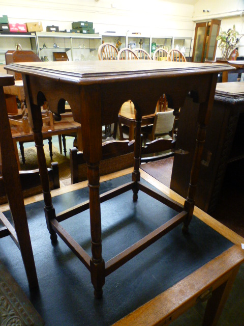 A mid-20th century oak occasional table