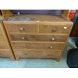 A mid 20th century oak and ply chest of