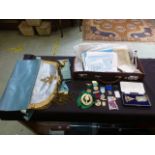 A Masonic case containing an assortment