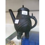 An eastern cast metal teapot