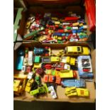 Two trays of diecast trucks and cars