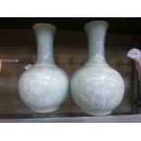 A pair of 20th century Chinese celadon g