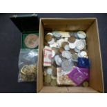 A box of assorted coinage