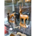 A selection of carved wooden animals etc